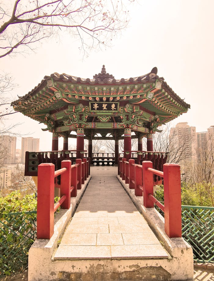 Beautiful traditional Korean pavilion with cityscape backdrop in Seoul, South Korea.