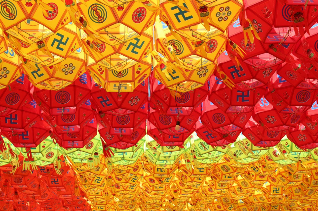 Vibrant Asian lanterns illuminate Samgwangsa Temple, Busan, celebrating Korean Buddhism.